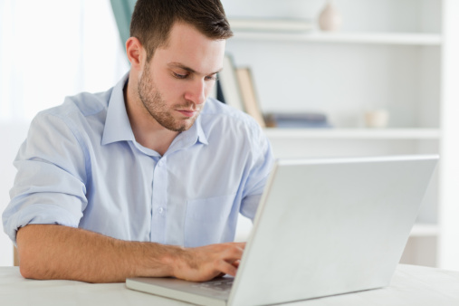 man using laptop