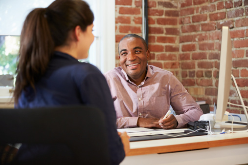 manager smiling at employee