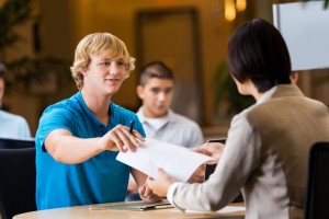 young man interviews for job