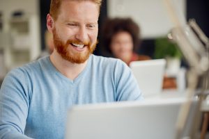 Man working at laptop computer