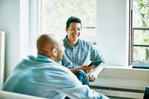 Two men talking