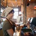 Young woman barista