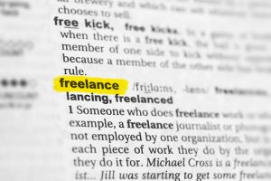 dictioanary page with definition of freelance