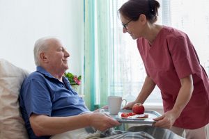 healthcare worker assisting patient