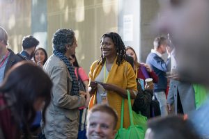 Professionals networking at an event