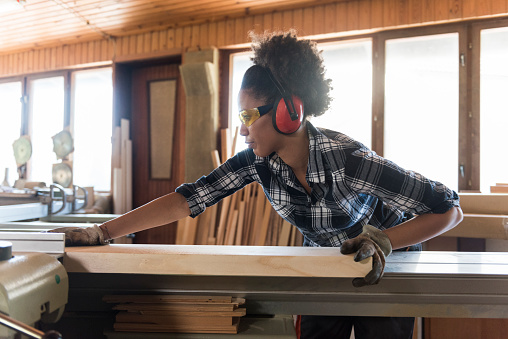 African american woman carpenter working