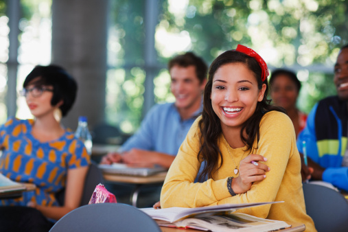 Happy high school student in classroom